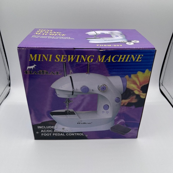 Mini sewing machine with bobbins and foot pedal/New in Box/Never used - Picture 1 of 3
